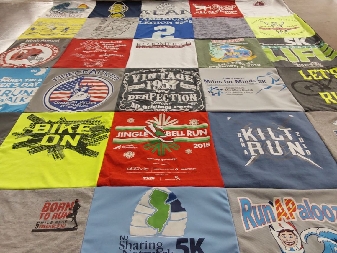 T-shirt quilt with running, cycling themes by Rose from NJ