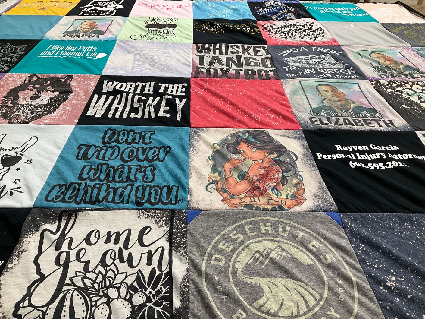 T-shirt quilt with art, whiskey themes by Rayve from AZ
