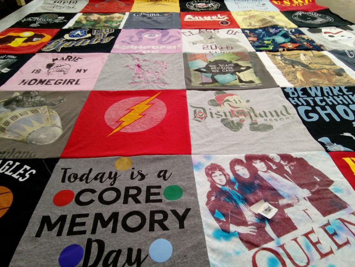T-shirt quilt with disney, music themes by Vicki from CO
