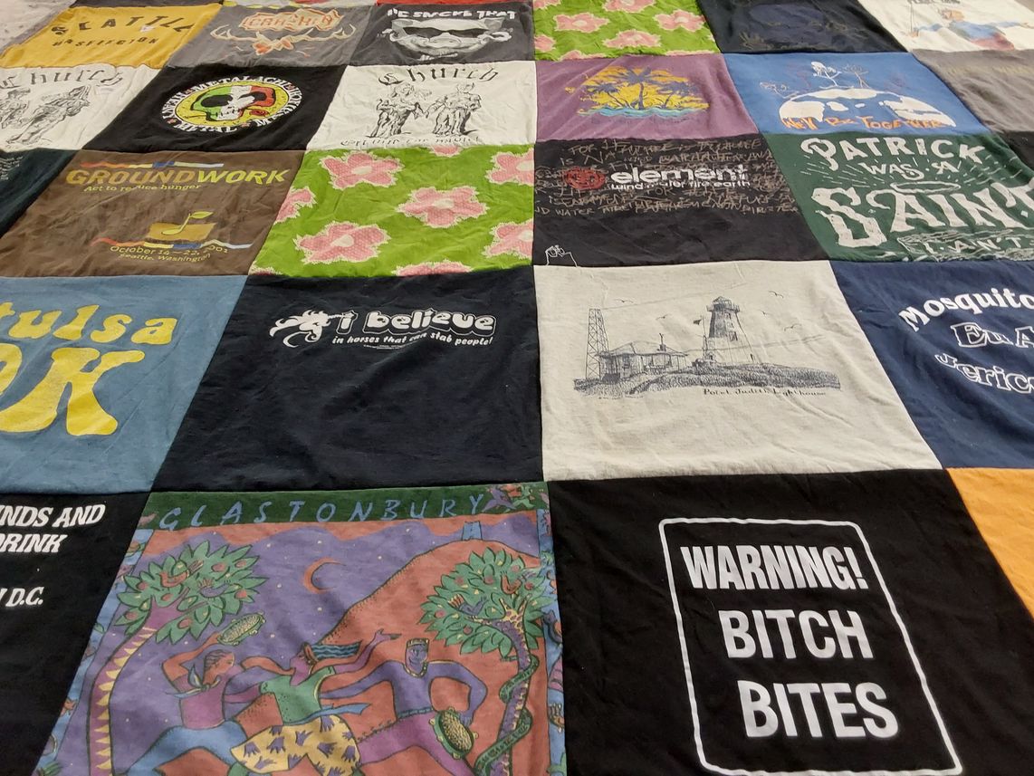 T-shirt quilt with art, activism themes by Shannon from WA