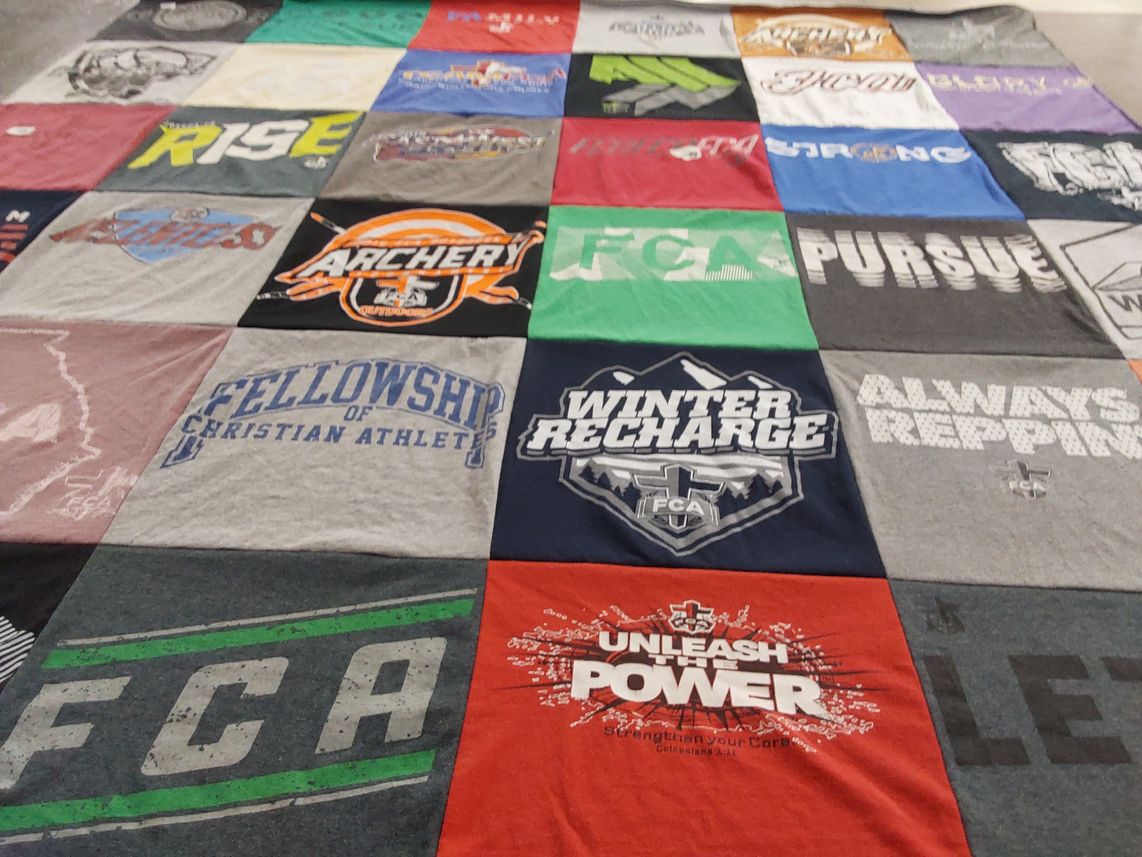 T-shirt quilt with archery, christianity themes by michelle from GA