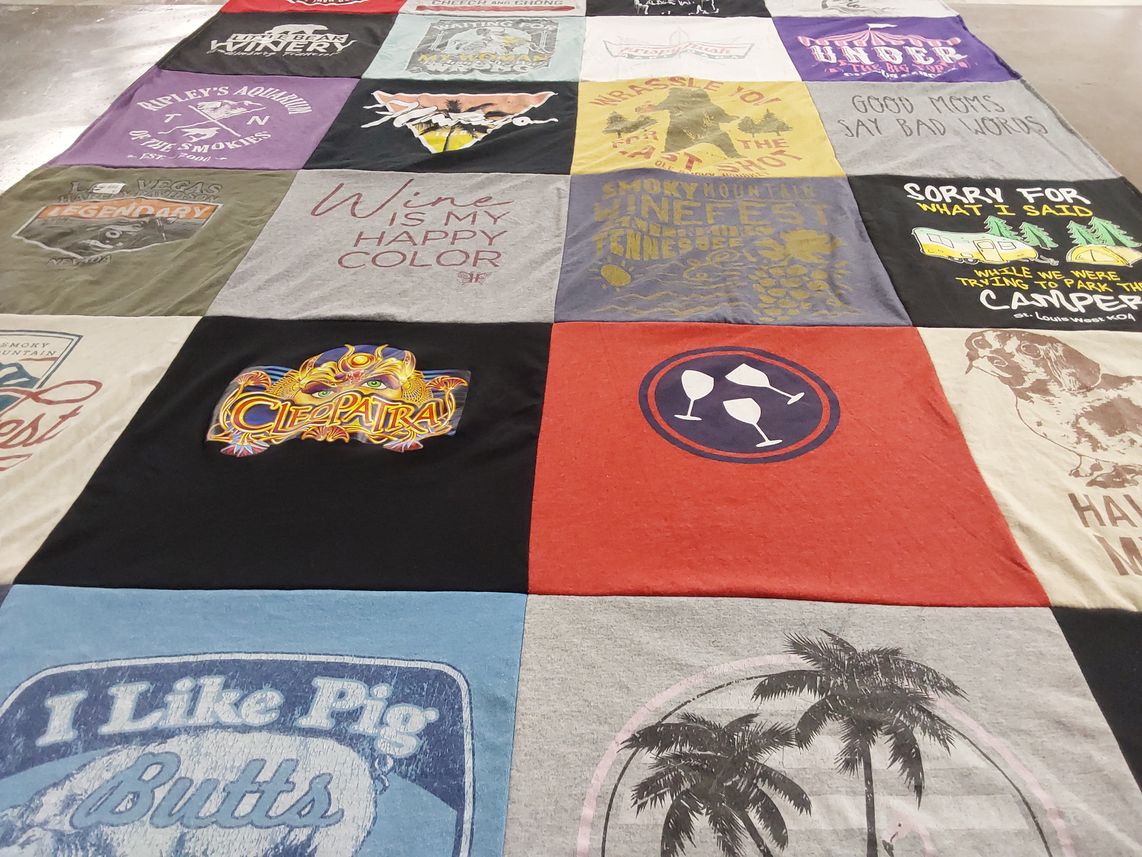 T-shirt quilt with wine, camping themes by Jennifer from IL