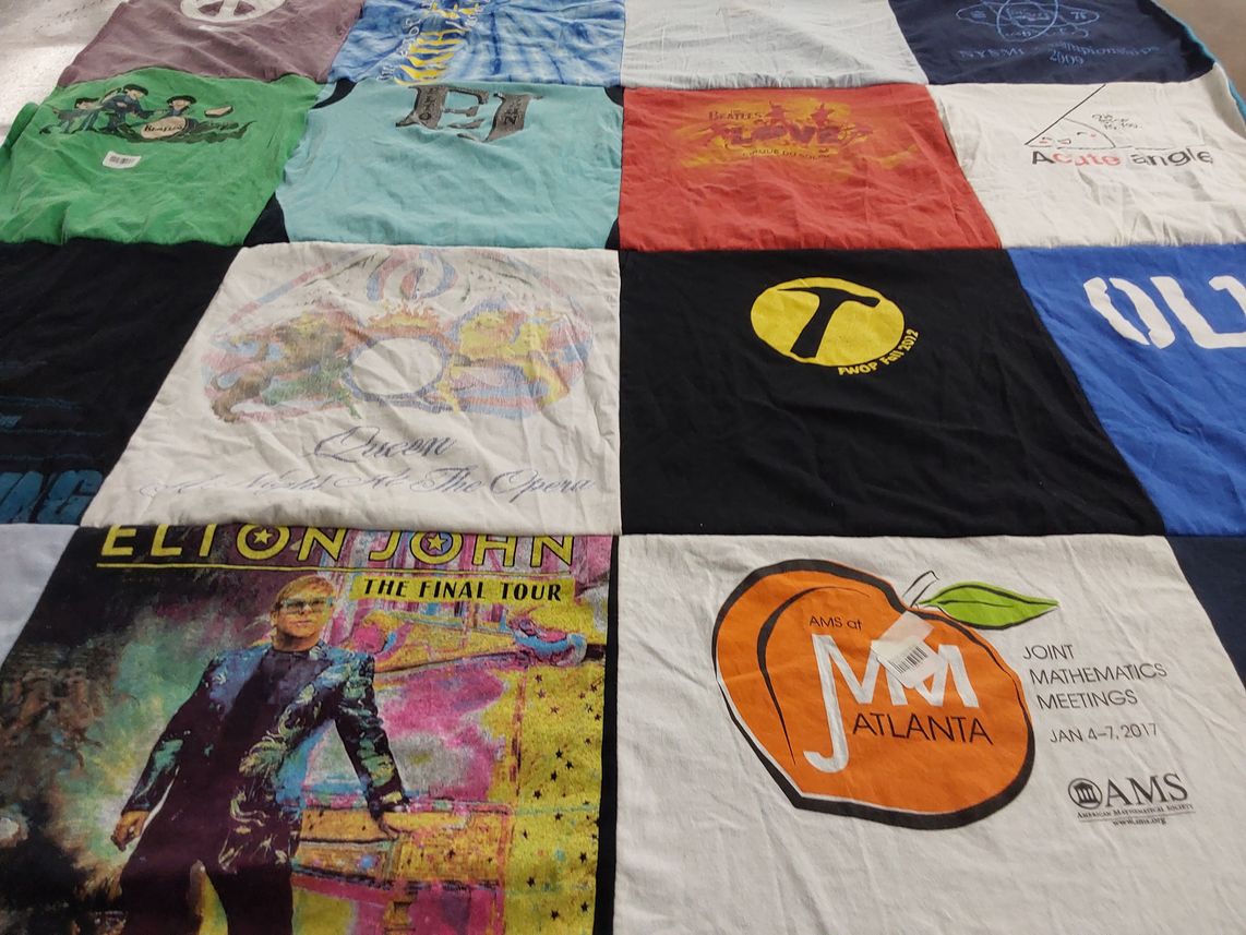 T-shirt quilt with music, mathematics themes by Elizabeth from WA