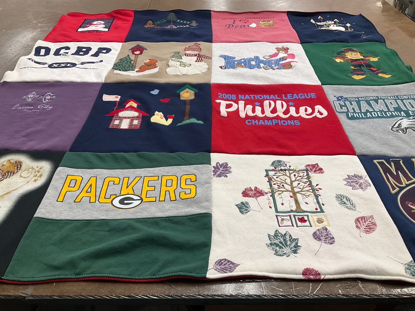 T-shirt quilt featuring green bay packers, philadelphia phillies by Cathy from PA