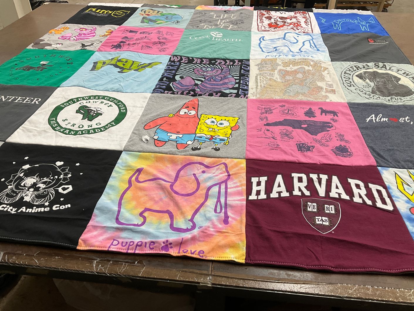 T-shirt quilt from harvard university, southwest guilford high school by Carrie from NC