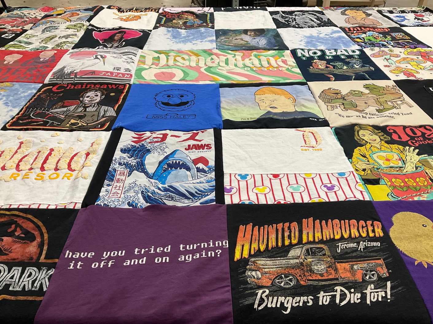 T-shirt quilt with theme parks, movies themes by Amy from CA
