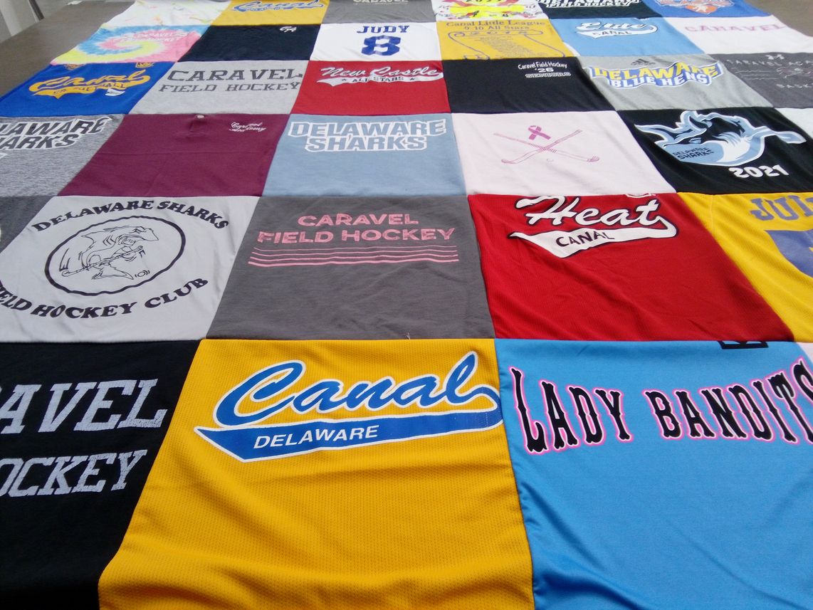 T-shirt quilt featuring delaware sharks, caravel field hockey club by Jennifer from DE