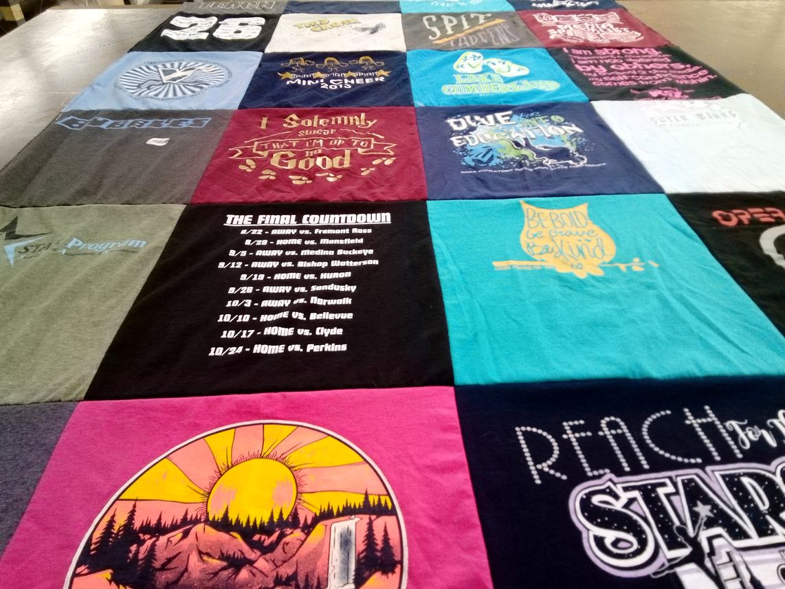 T-shirt quilt with education, community themes by Mandy from OH