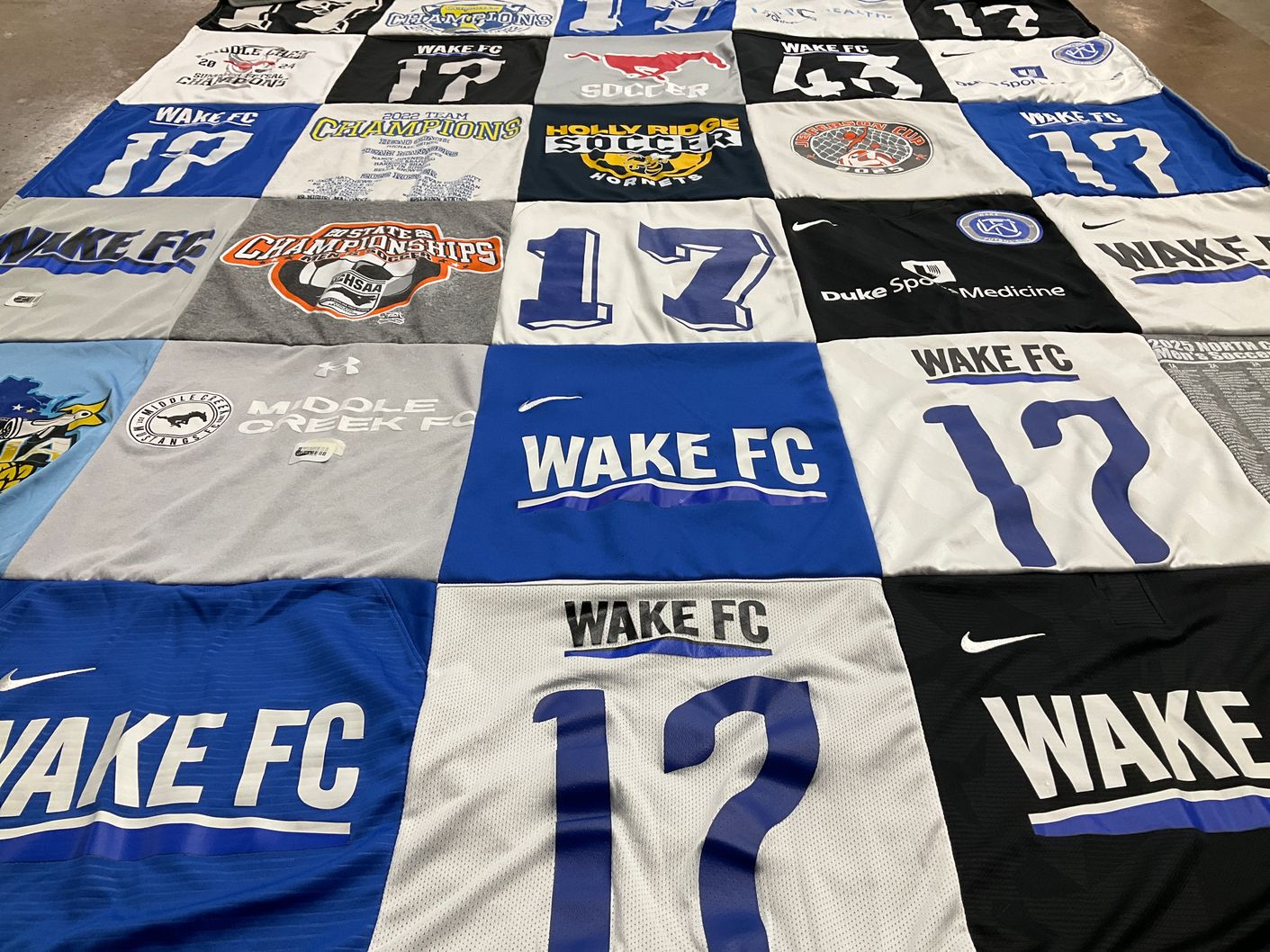 T-shirt quilt with soccer themes by Kristi from NC