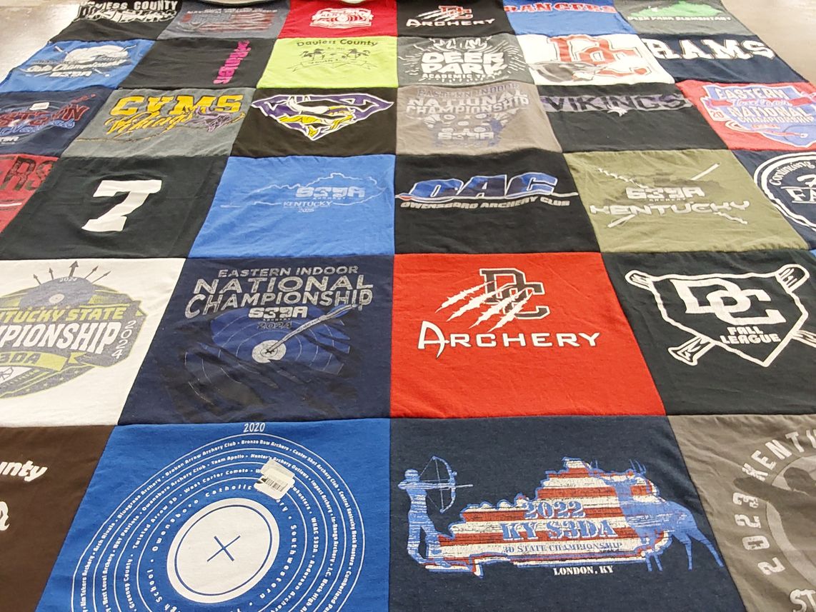 T-shirt quilt with archery, sports themes by Tammy from KY
