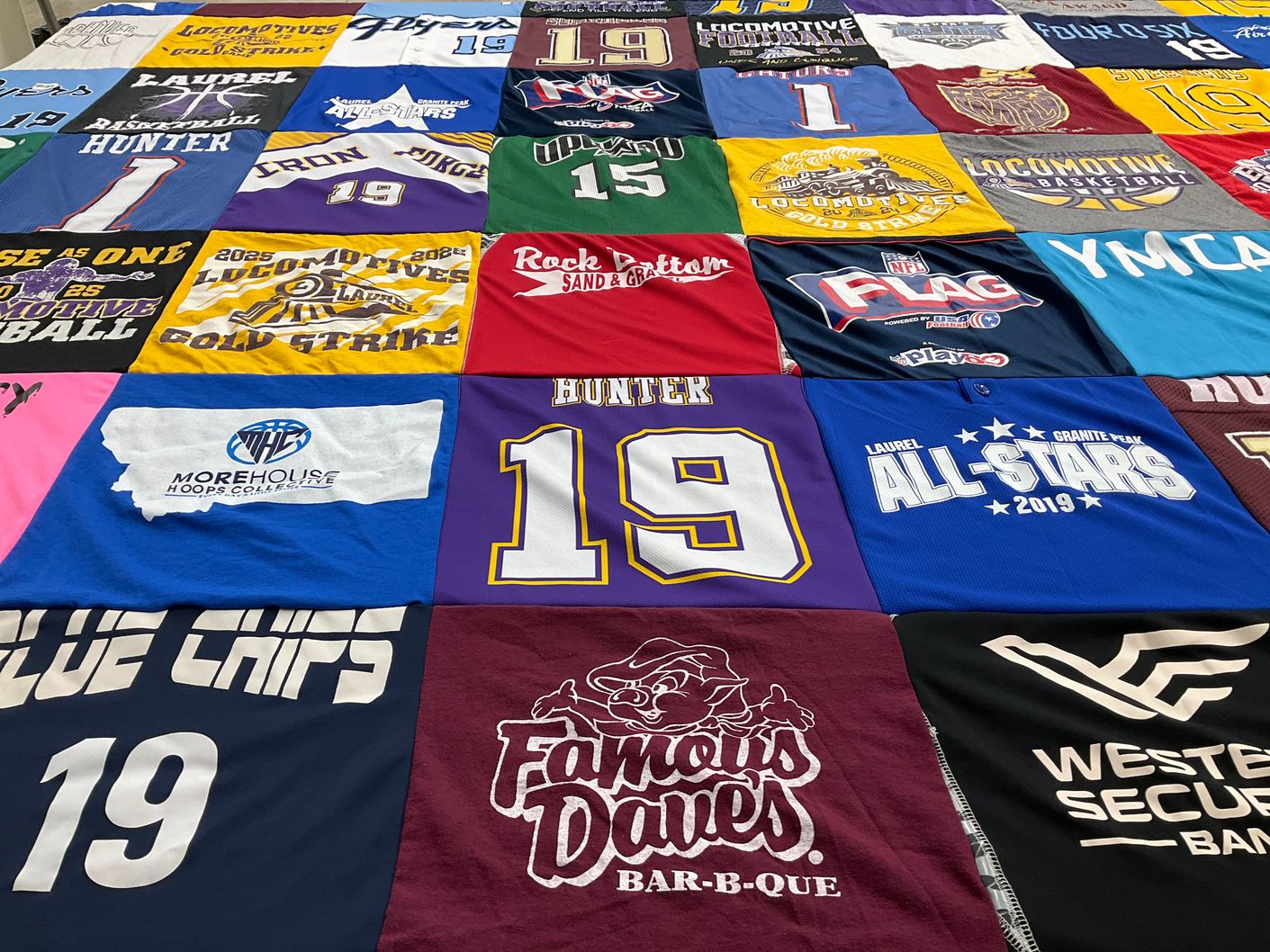 T-shirt quilt featuring laurel all-stars by Comeec from MT