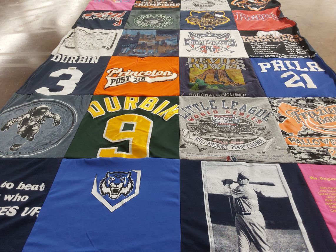 T-shirt quilt with baseball, astronomy themes by Jean from NJ