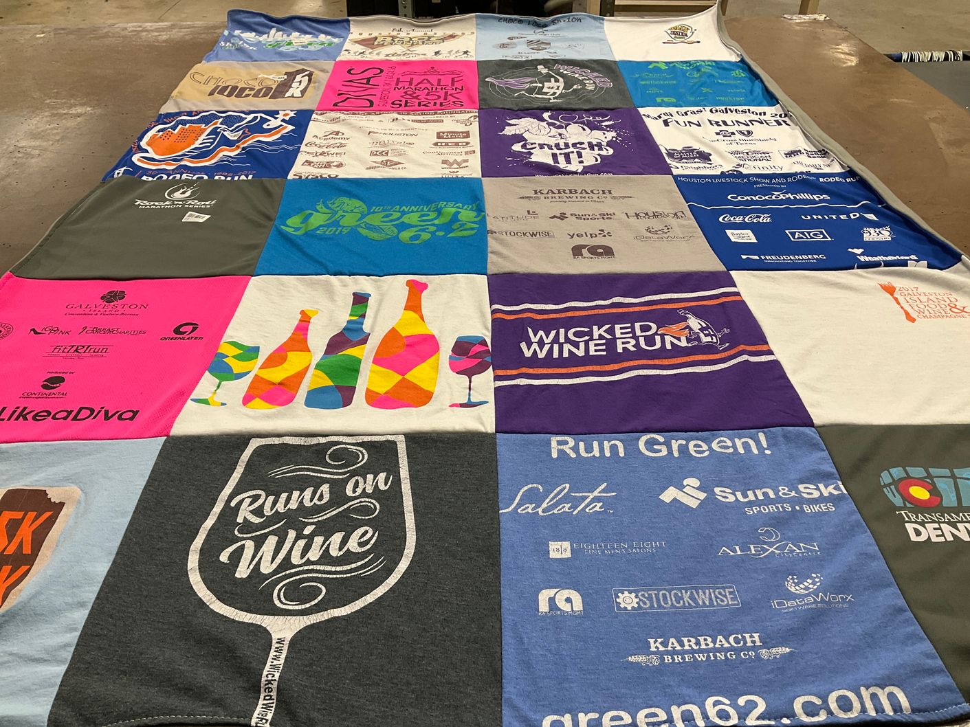 T-shirt quilt with running, wine tasting themes by Stacey from TX