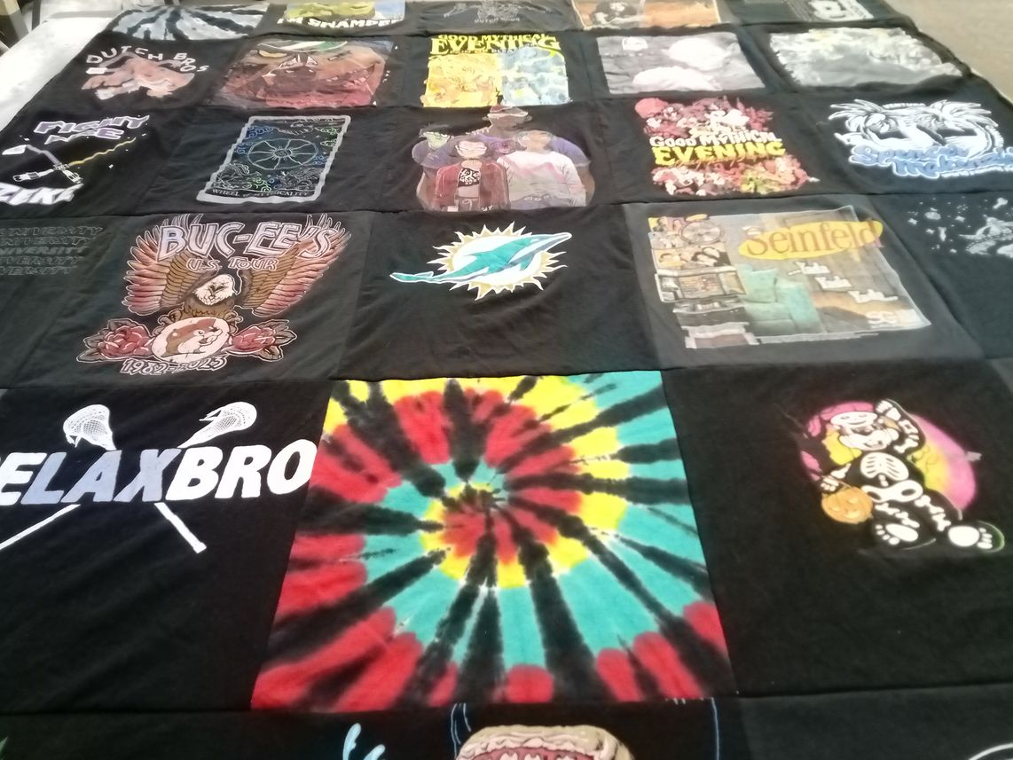 T-shirt quilt with comedy, music themes by Hunter from NV