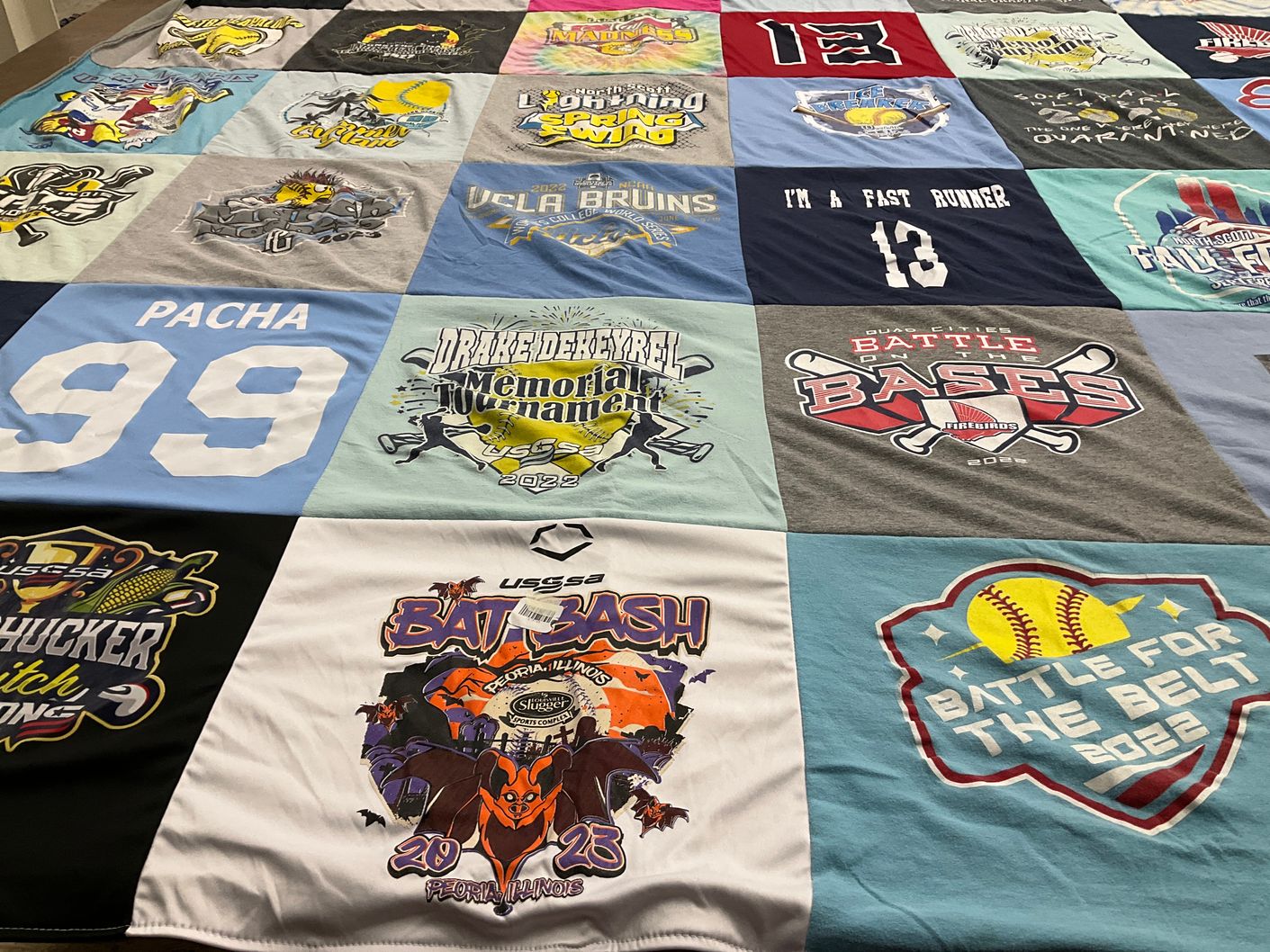 T-shirt quilt with softball, baseball themes by Christy from IA