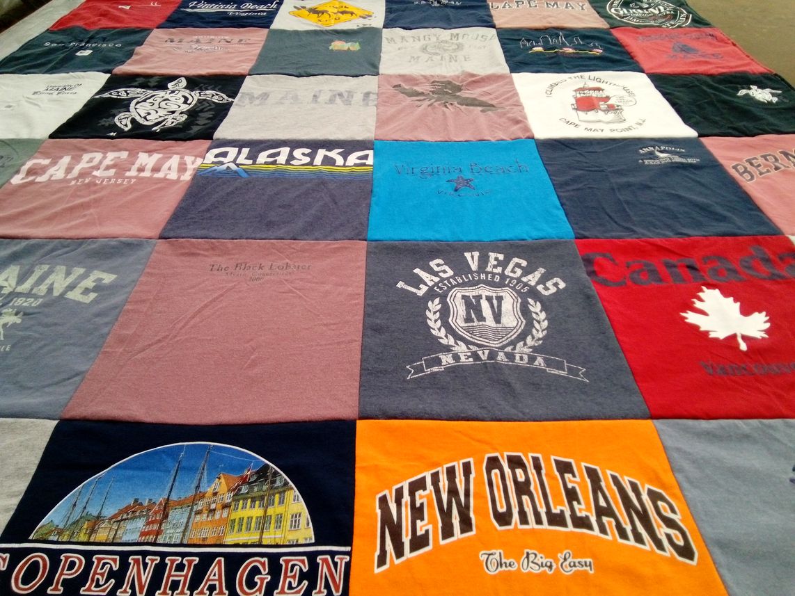 T-shirt quilt with travel, tourism themes by Harlene from NY