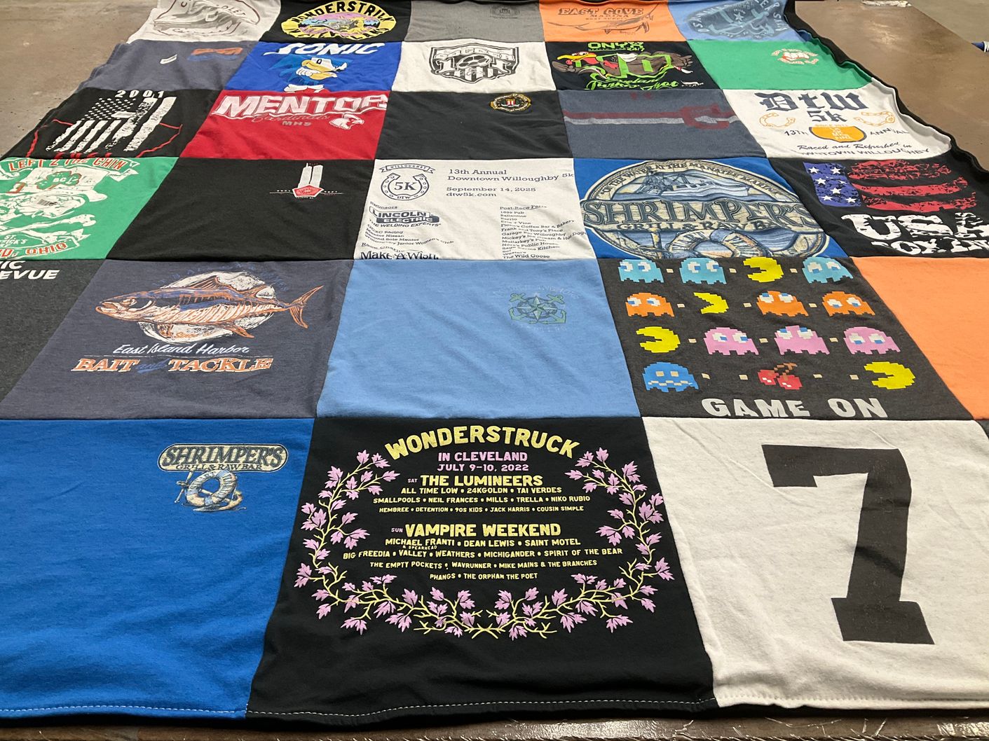 T-shirt quilt with music, fishing themes by C from OH
