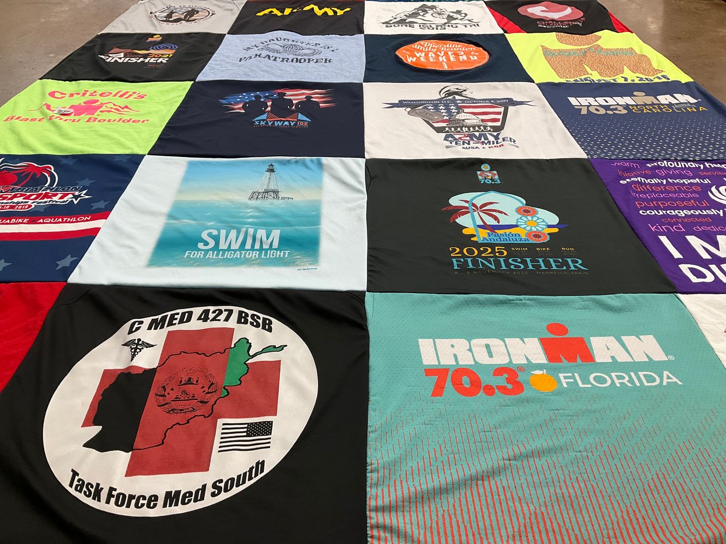 T-shirt quilt with fitness, swimming themes by April from FL