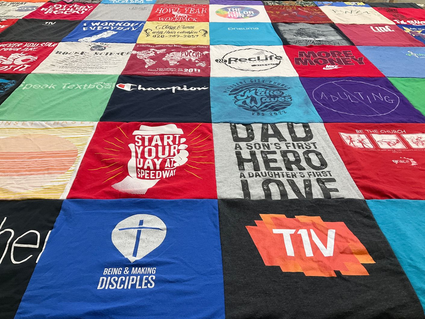 T-shirt quilt with fitness, family themes by Peter from NC