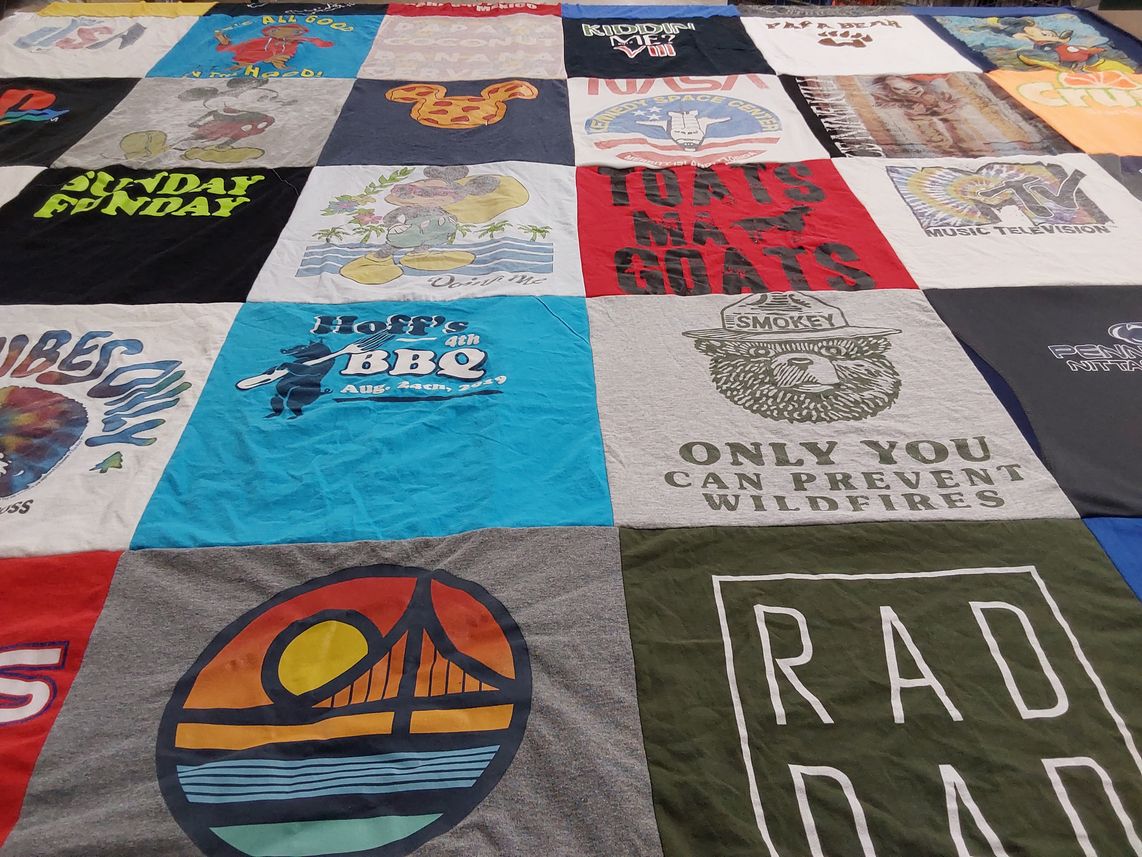 T-shirt quilt with cooking, music themes by Erin from PA