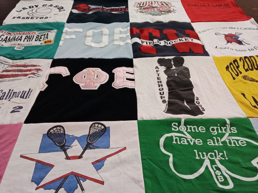 T-shirt quilt with sports, sororities themes by Heidi from WI