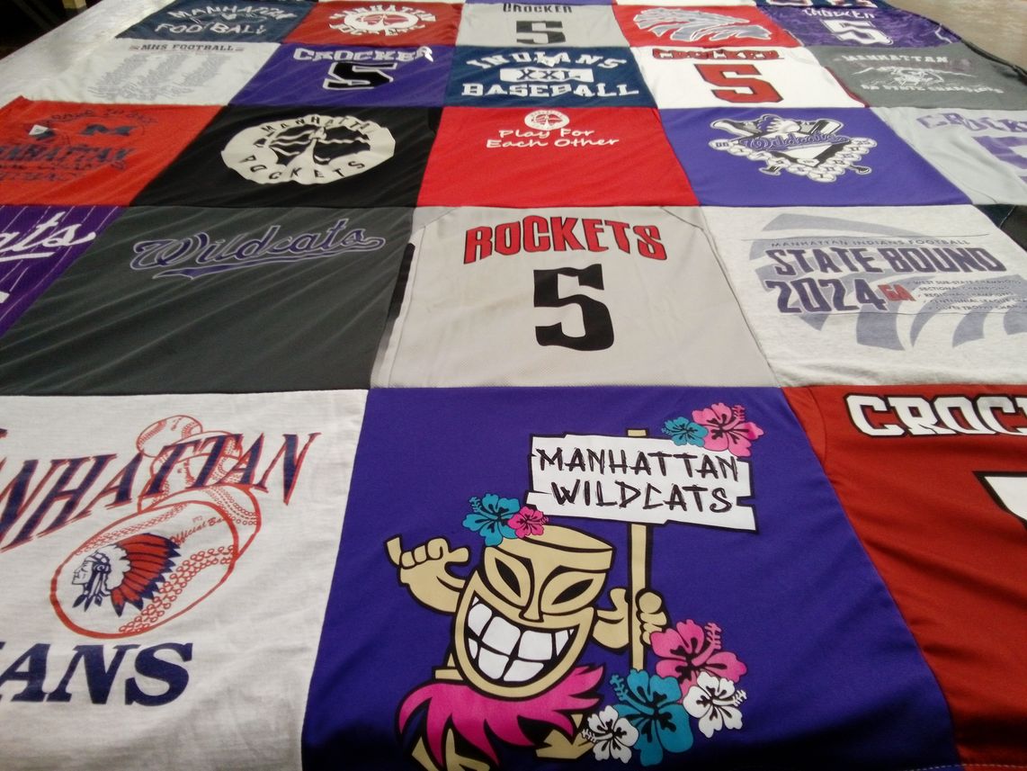 T-shirt quilt featuring manhattan wildcats, manhattan rockets by Taira from KS