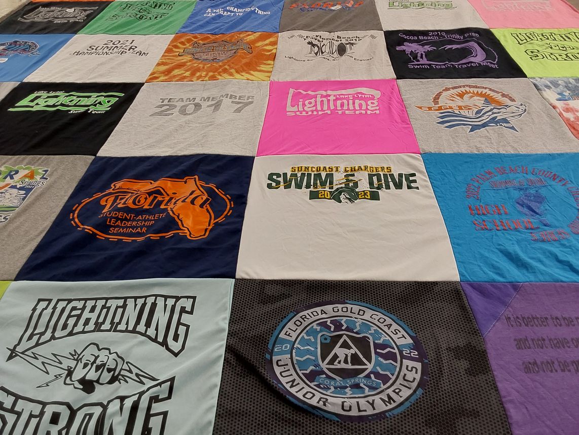 T-shirt quilt featuring lightning swim team by Allison from FL