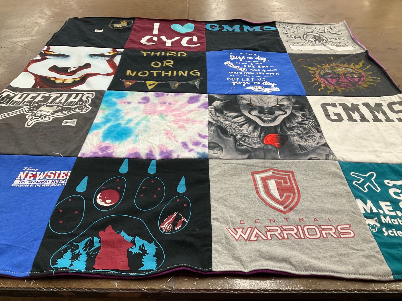 T-shirt quilt featuring central warriors, cheetahs by PAULA from CO