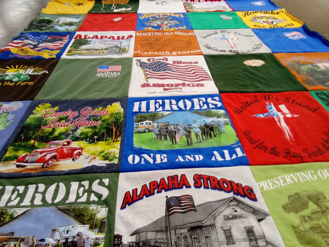 T-shirt quilt with community, history themes by Norma from GA