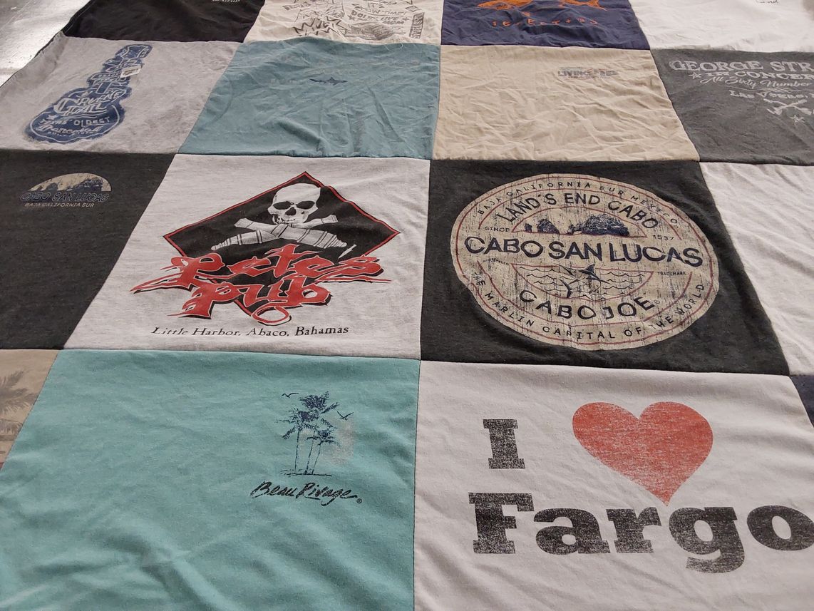 T-shirt quilt with travel, beaches themes by Heather from TX
