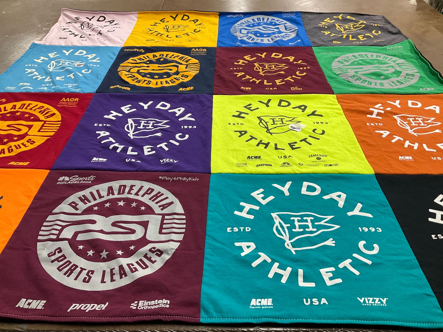 T-shirt quilt with sports, community themes by Joanne from SC