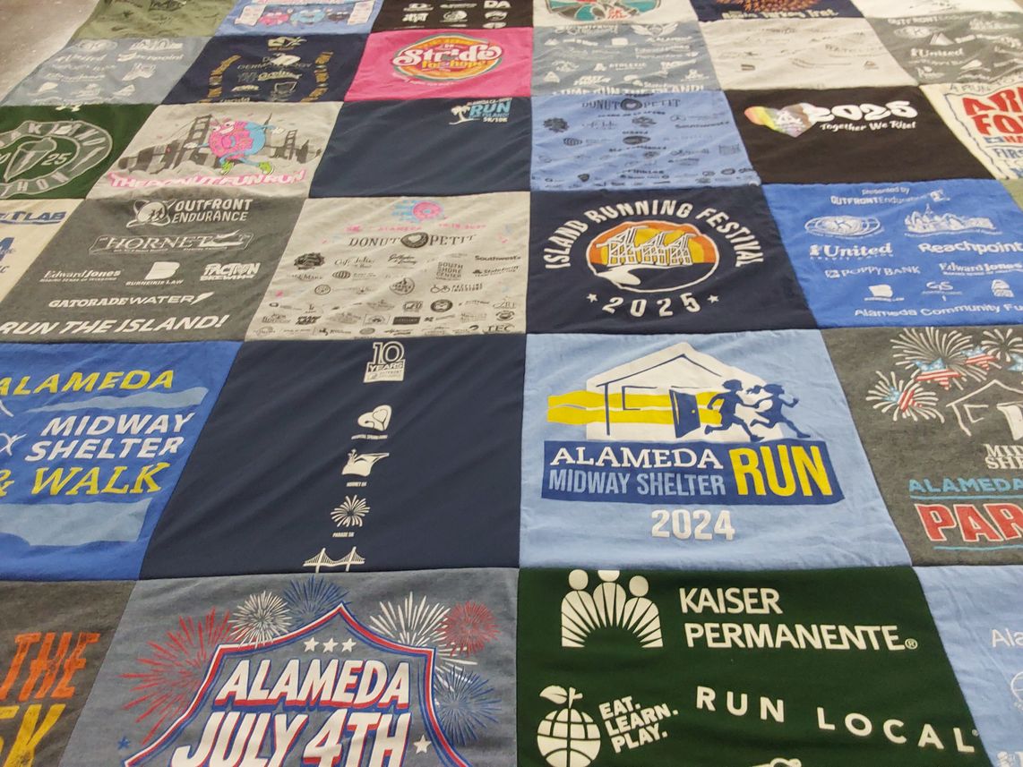 T-shirt quilt with running, community service themes by Teresa from CA