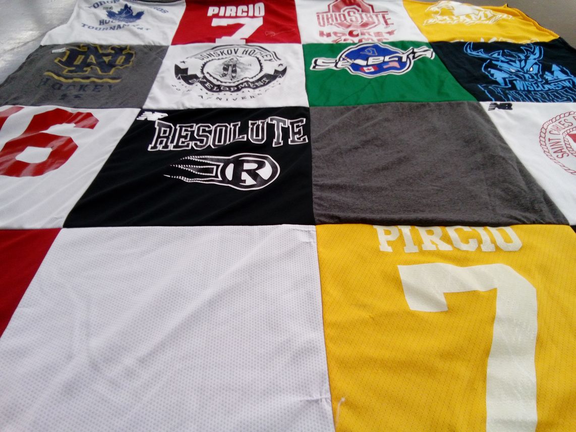 T-shirt quilt featuring ohio state university hockey, university of wisconsin hockey by Jean from OH
