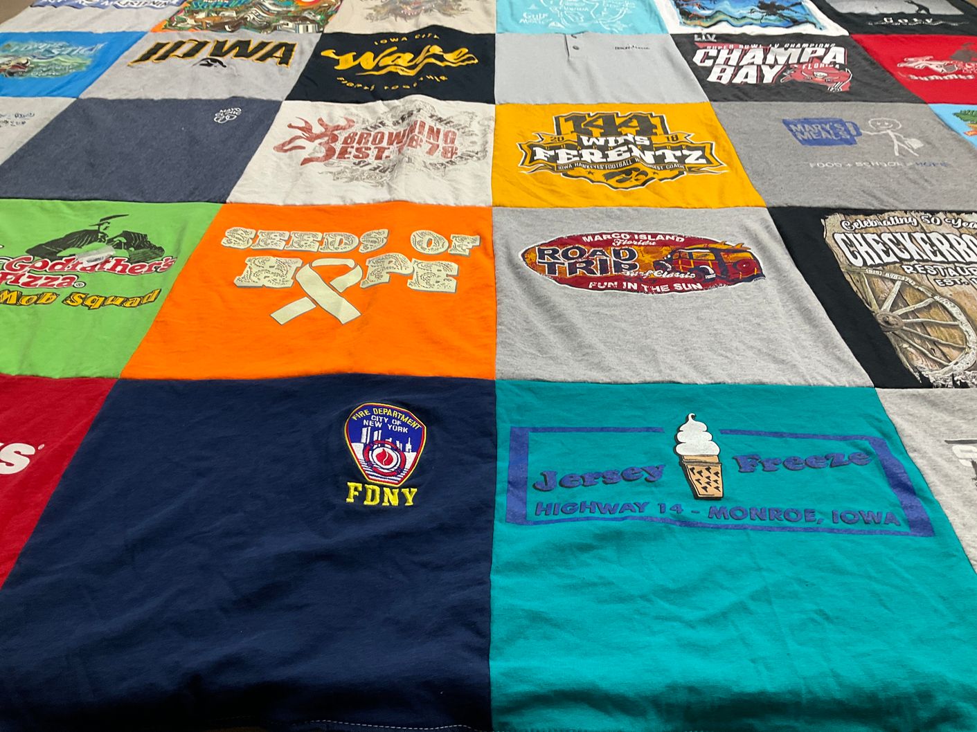 T-shirt quilt with pizza, food themes by Connie from IA