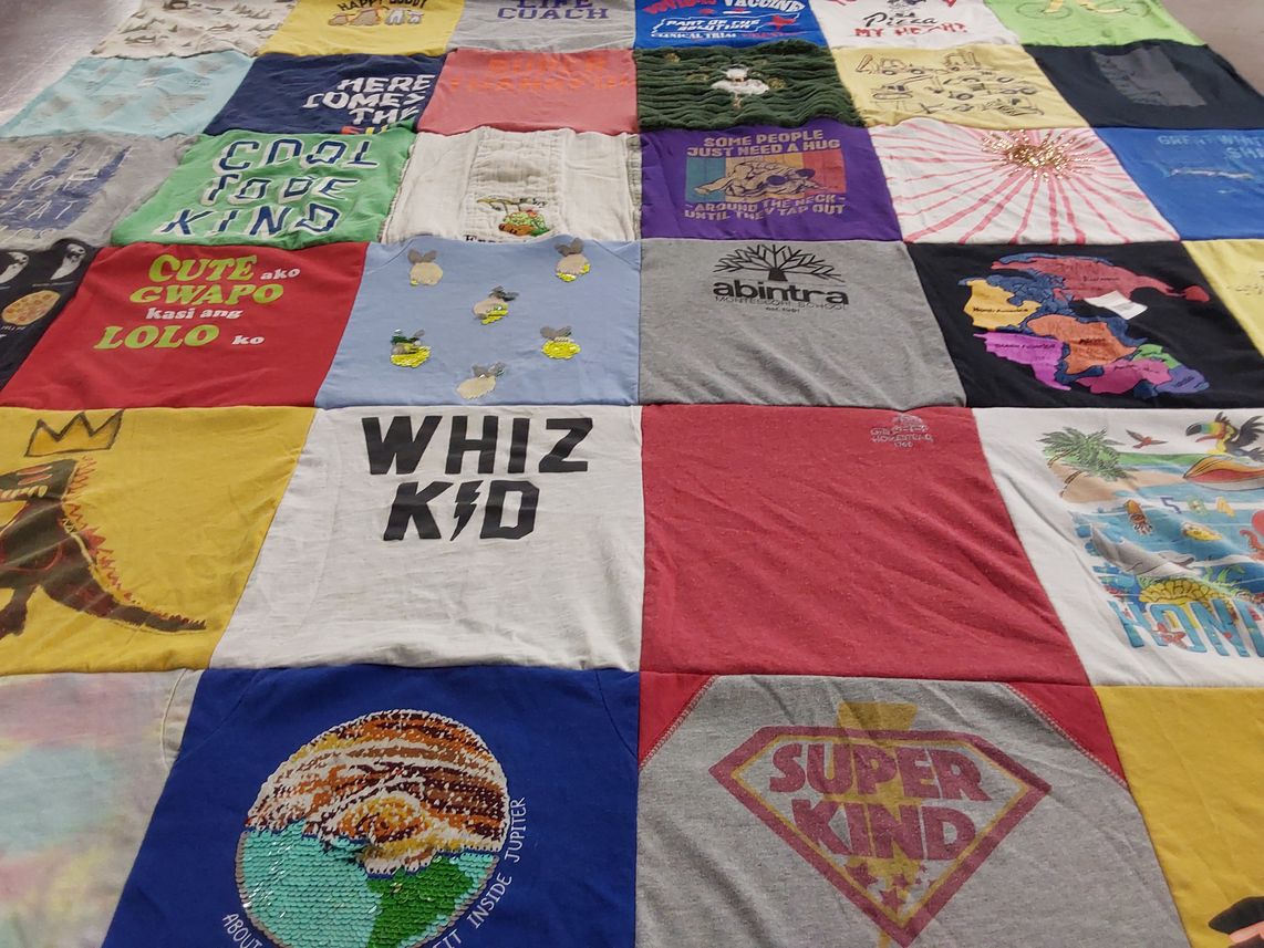 T-shirt quilt with science, humor themes by Lealani from TN