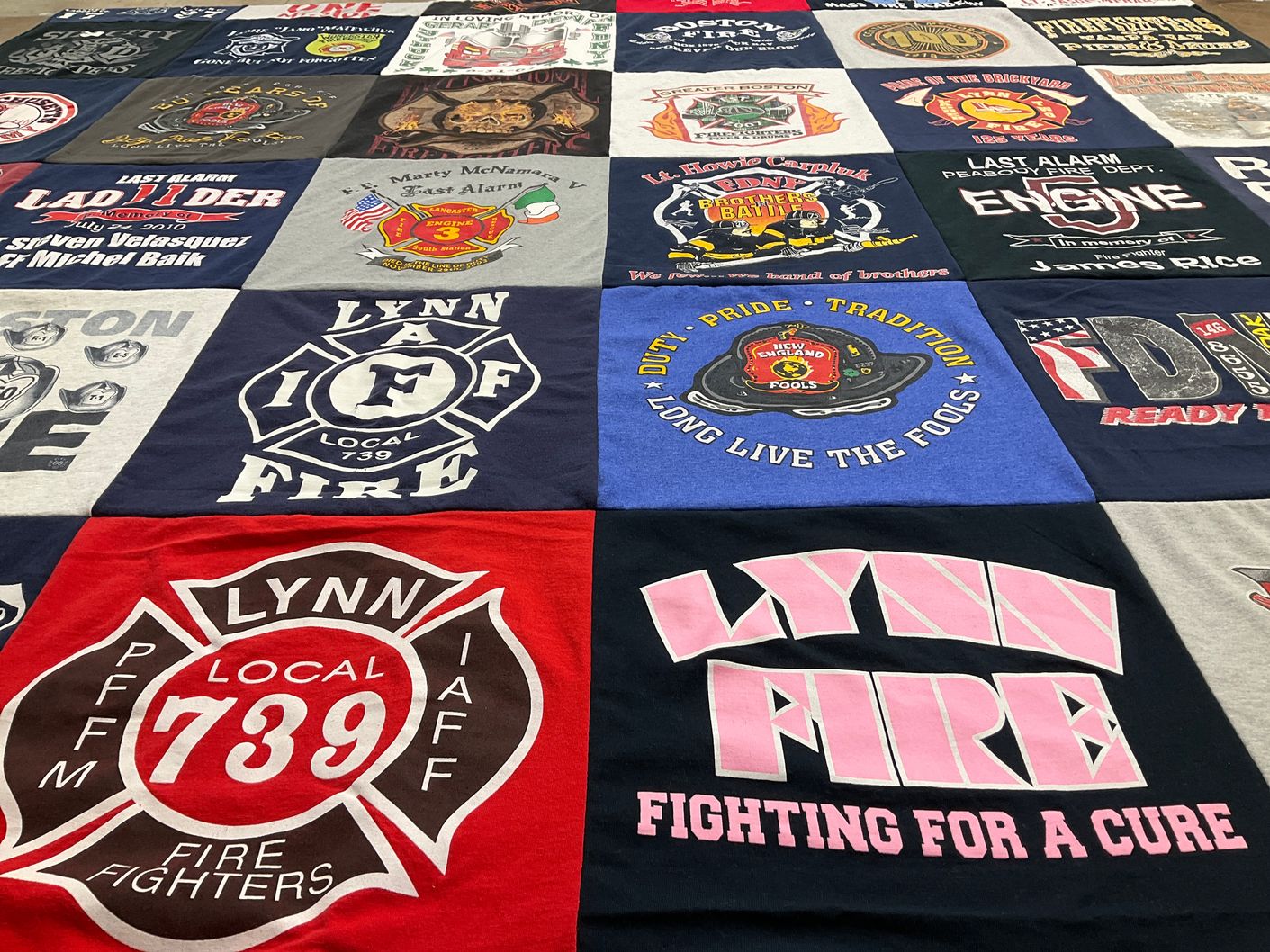 T-shirt quilt with firefighting themes by Derek from MA