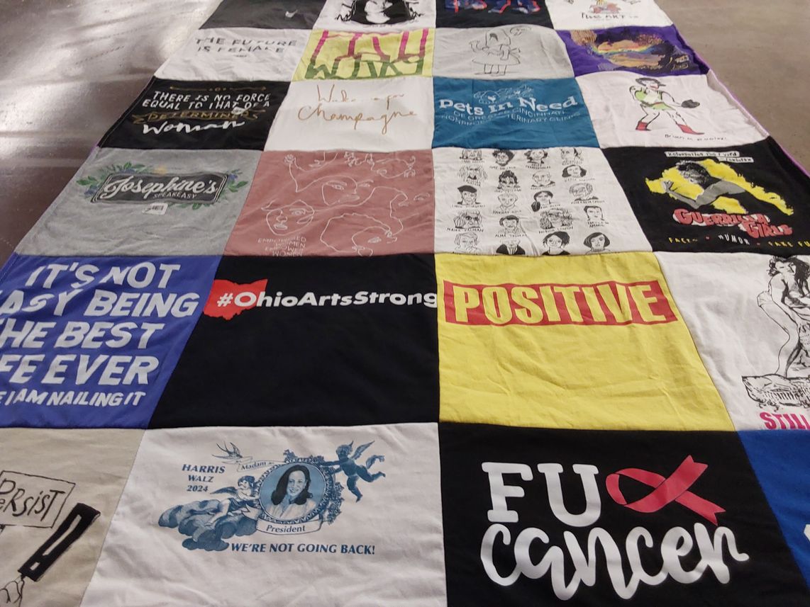 T-shirt quilt with art, activism themes by Sara from OH