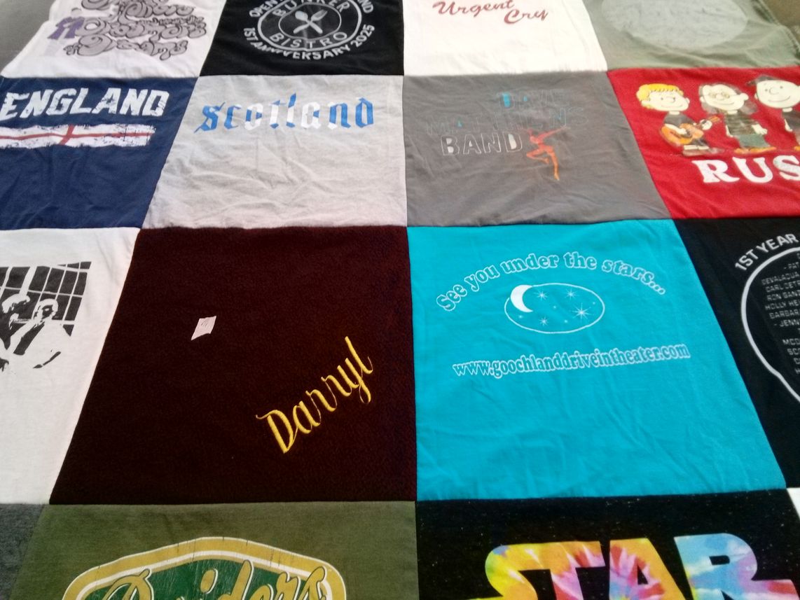 T-shirt quilt with music, theater themes by Laura from VA
