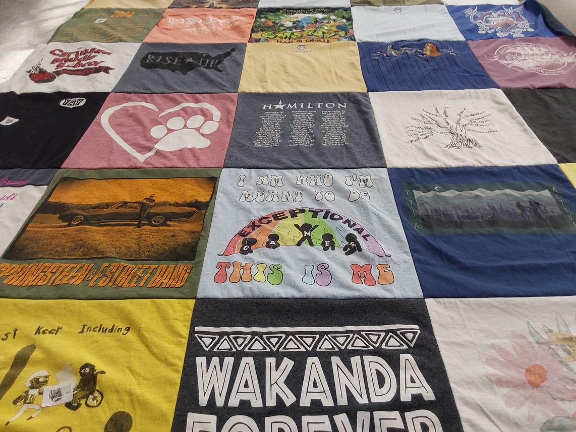 T-shirt quilt with music, theater themes by Danielle from NY
