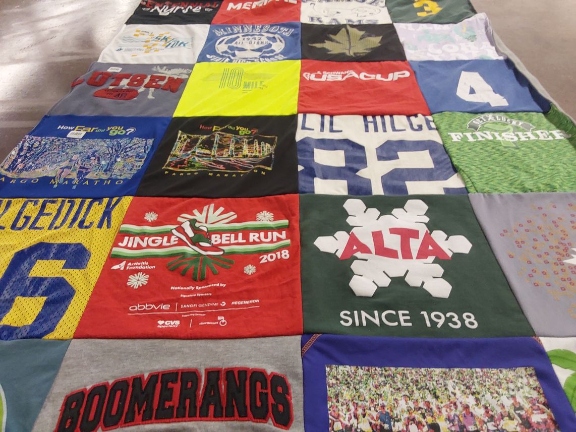 T-shirt quilt with running, marathons themes by Christine from MN