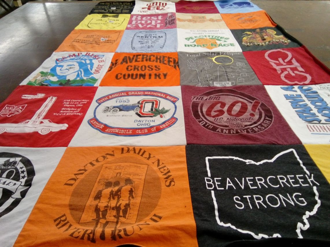 T-shirt quilt with running, automobiles themes by Debra from OH