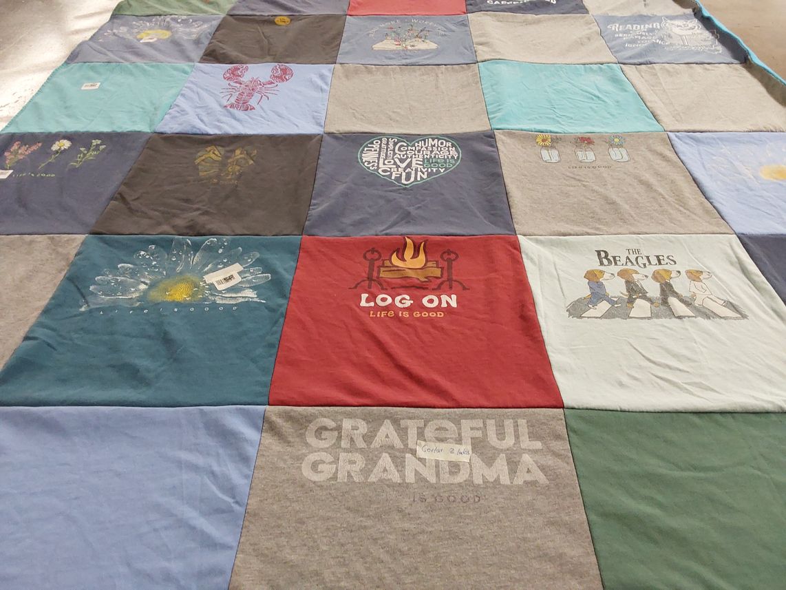 T-shirt quilt with reading, family themes by Jean from TN
