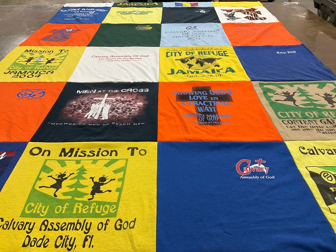 T-shirt quilt with religion, community service themes by Donna from FL