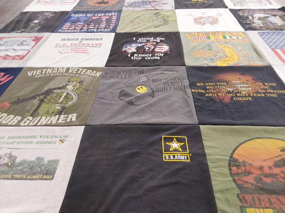T-shirt quilt with military, veterans themes by Cynthia from CA
