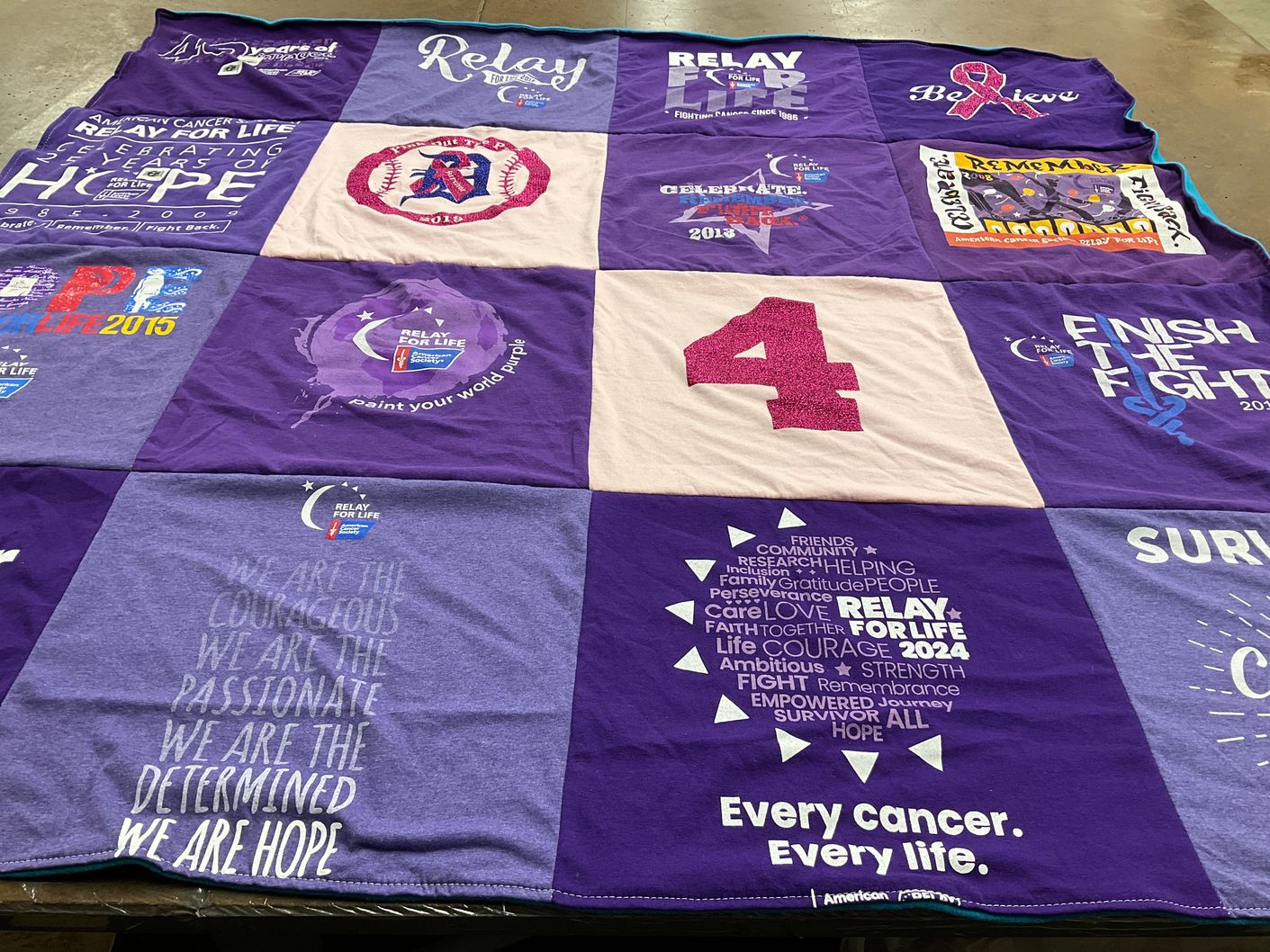 T-shirt quilt with cancer awareness, support themes by Jane from OH