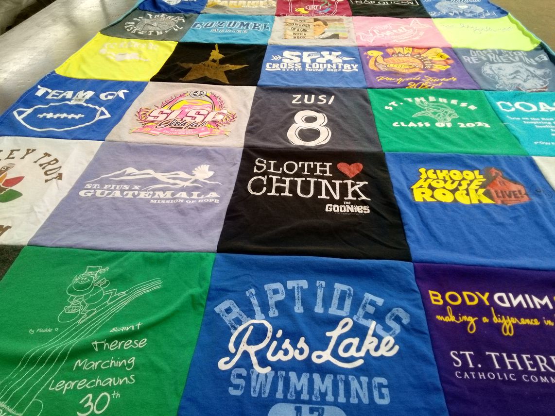 T-shirt quilt featuring st therese marching leprechauns, rip tides swim team by Colleen from MO