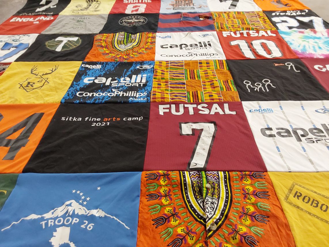 T-shirt quilt with sports, art themes by Annie from AK