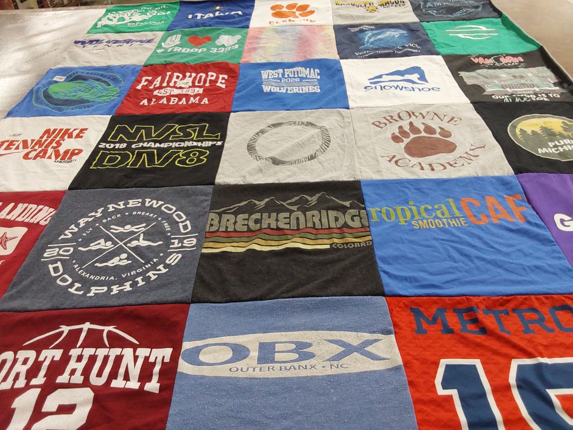 T-shirt quilt featuring waynewood dolphins by Catherine from VA