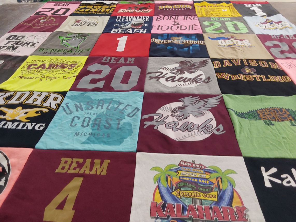 T-shirt quilt featuring davison wrestling, kdhr swimming by Rebecca from MI
