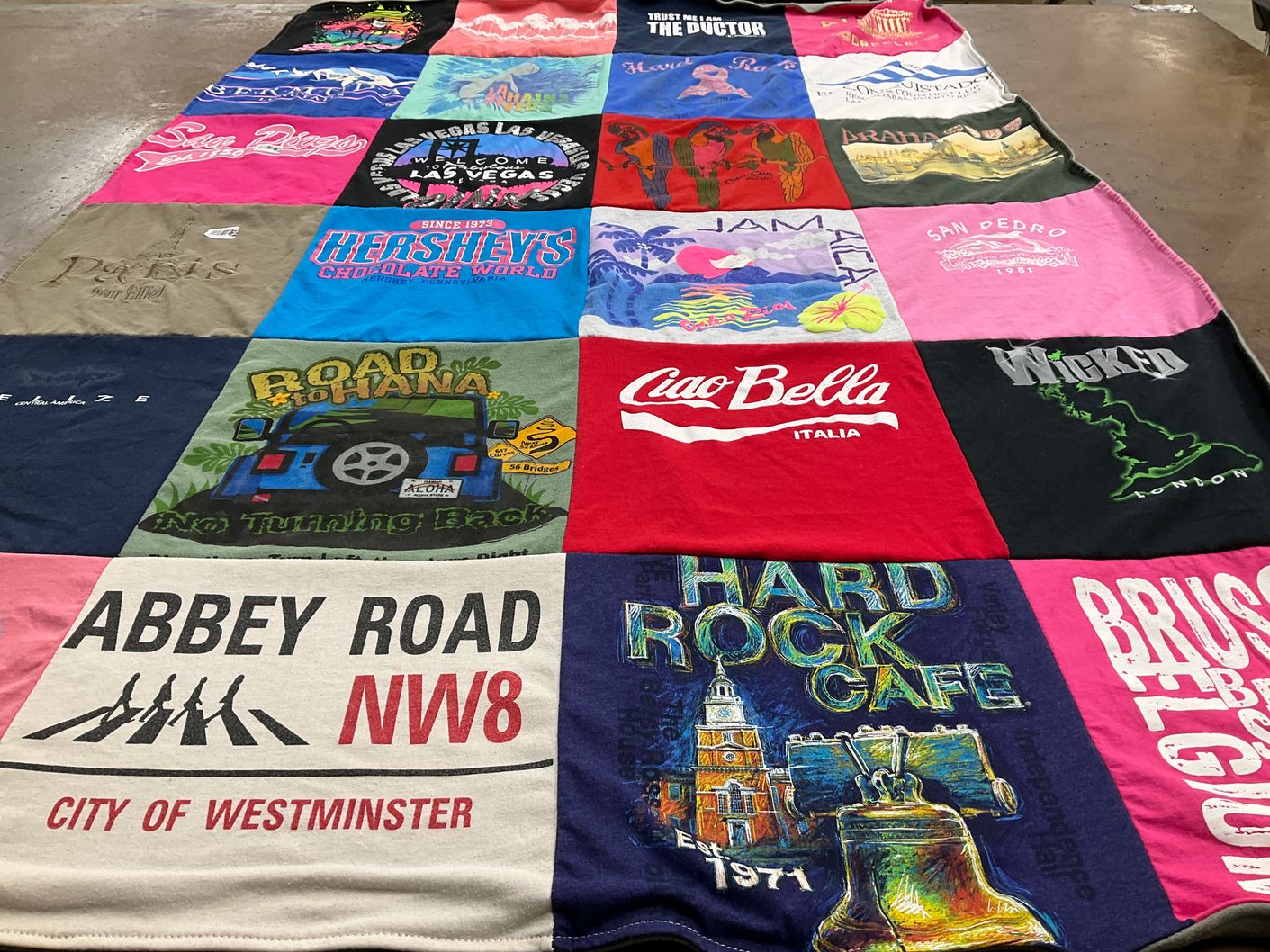 T-shirt quilt with travel, music themes by Karen from NC